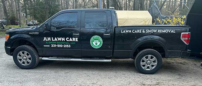 JLH Lawn Care & Snow Removal truck